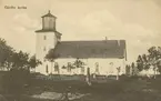 Vykort med motiv av Gårdby kyrka.