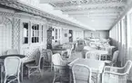 Titanic.
Café Parisien i första klass.