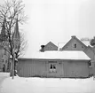 Skara. 
Kvarteret Iris nr. 3.
Bommagatan mot sydväst.
Domkyrkan och Biblioteket i bakgrunden.