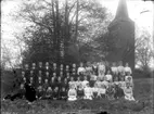 Kyrkan. 
Amnehärads socken, Gullspångs kommun. 
Kyrkoherde Lars Östlund, *1863, död 1946. Kyrkoherde i Amnehärad 1910-1946, med 1912 års konfirmander i Amnehärads kyrka. 
Blända från Delebäck med på fotot. 
Gullspångssamlingen. 
Bilder från Gullspång med omnejd.