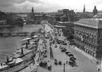 2000-08-30, AS. Stockholm, Strömkajen och en provisorisk bro över Strömmen, i 
mitten av bilden ligger Operan och i bakgrunden ser vi Stadshuset.