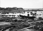 Strand vid Östersjön, sannolikt vid Haruddens fiskebodar, Älvkarleby