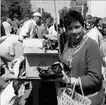 Lions loppmarknad på Södra Torget i Karlsborg, år 1969. Ann-Marie Nicklasson närmast i bild.