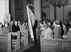 Karlsborg, armelottakårens 25-års jubileum i Garnisonskyrkan år 1959. Fanbärare Astrid Ragnar. Freijds foto.