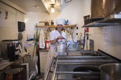 Stockholm Steam på Galärvarvet. En kocka med kaffepanna i ka