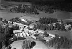 Flygfoto över Landsbro i Vetlanda kommun. Nr D 2250.