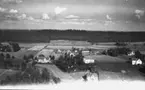 Flygfoto över Bondstorp i Vaggeryd kommun. Nr. H. 1940.