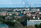 Stadsvy, över en del av söder mot höghusen på Brynäs och Korsnäs AB sulfitfabrik i bakgrunden.