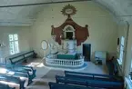Altare och predrikstol i Oslättfors kyrka.