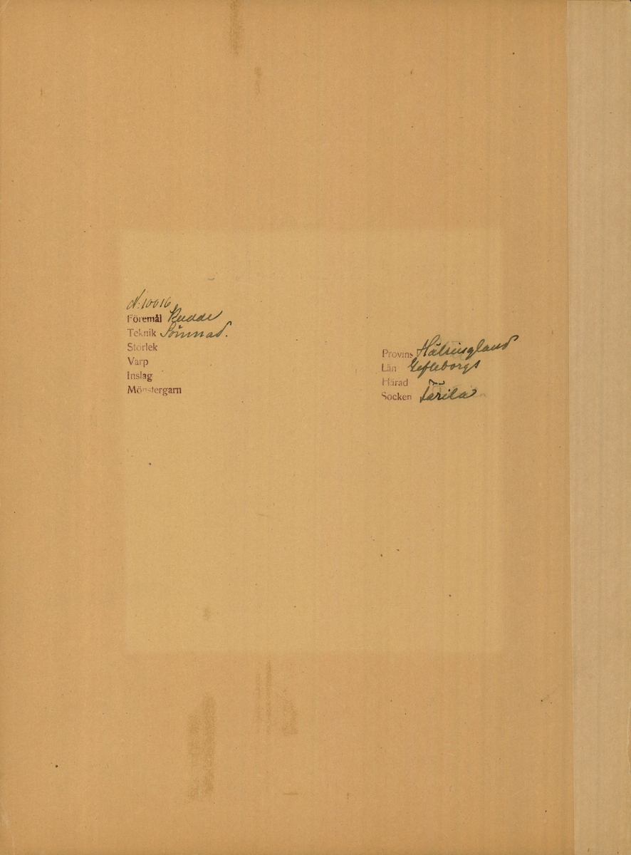 Kudde i fritt broderi.