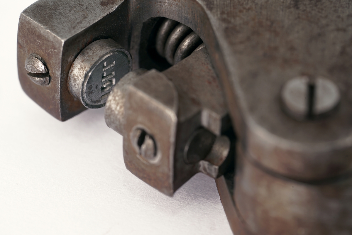 Plomberingstang av jern.