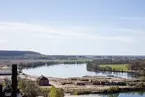 Vargön Alloys AB, utsikt från smältverkets tak. Västra Tunhem, Göta älv och det nedlagda pappersbruket