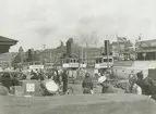 Gustavsbergsbåtar vid Skeppsbron i Stockholm.