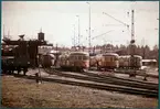 Bangården vid Gävle södra omkring år 1964. Ostkustbanans, OKB, lokstall i bakgrunden.