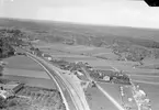 Flygfoto över Anneberg och stationshus.