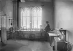 Laboratorium i jästfabriken, Upsala Ångqvarns AB, Östra Ågatan, Uppsala omkring 1913