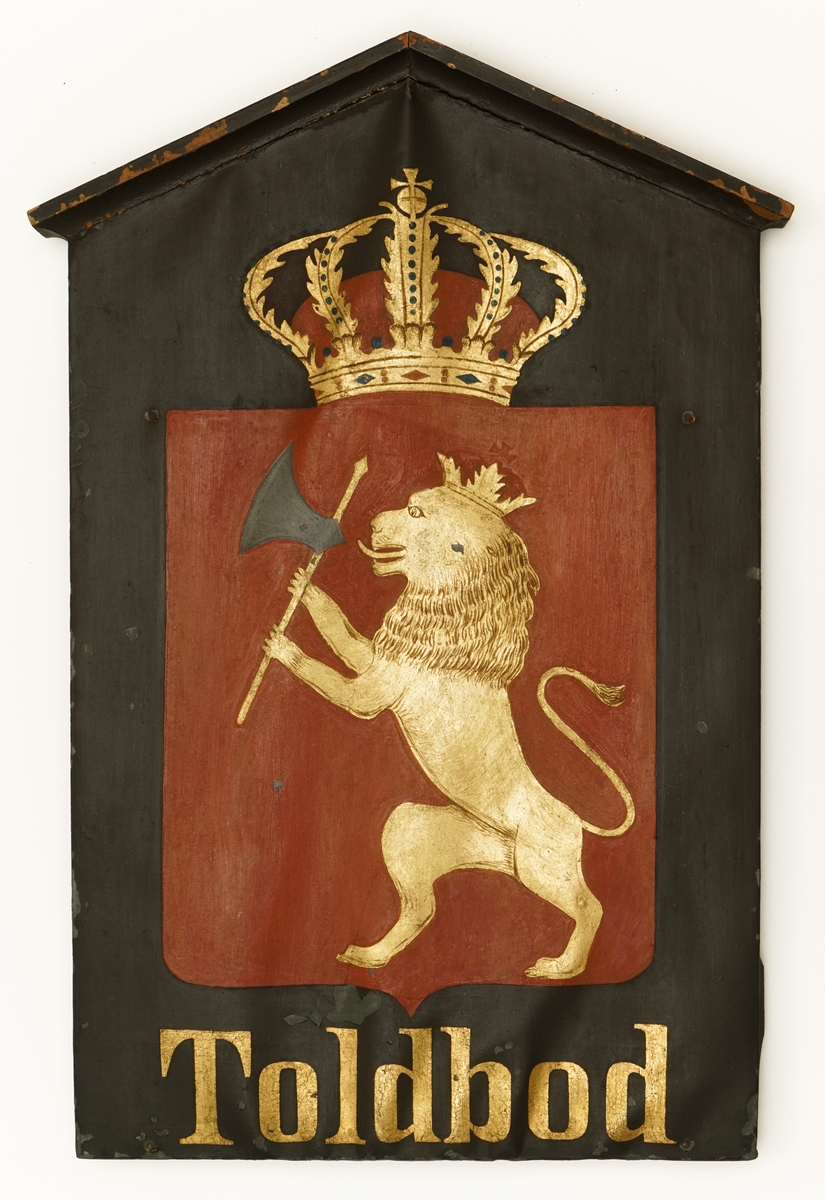 Riksvåpenet av 10.07.1844 over innskriften; "Toldbod".