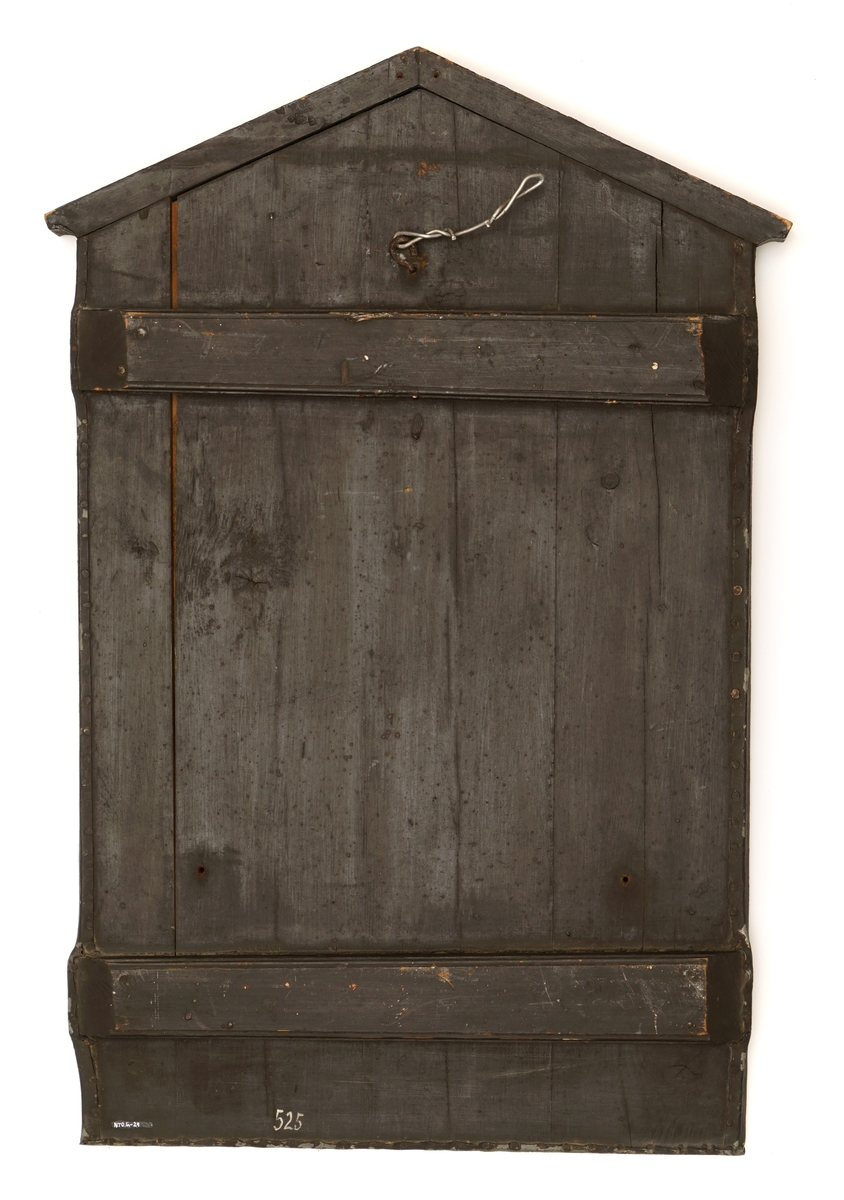 Riksvåpenet av 10.07.1844 over innskriften; "Toldbod".