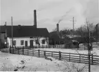 Häfla Bruk, Östergötland. Verkstäderna vid före detta Skärfors. Den vita byggnaden fungerade vid fotograferingstillfället som brukskontor.