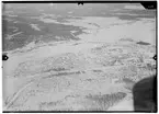 Flygfotografi av Rovaniemi samhälle. Snedbild tagen av flygare vid F 19, Svenska frivilligkåren i Finland under finska vinterkriget, 1940.