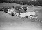 Flygfoto över Renstorp i Månsarp, Jönköpings kommun. Nr K 353.