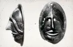 Beslag av brons i form av en ansiktsmask från romersk järnålder.