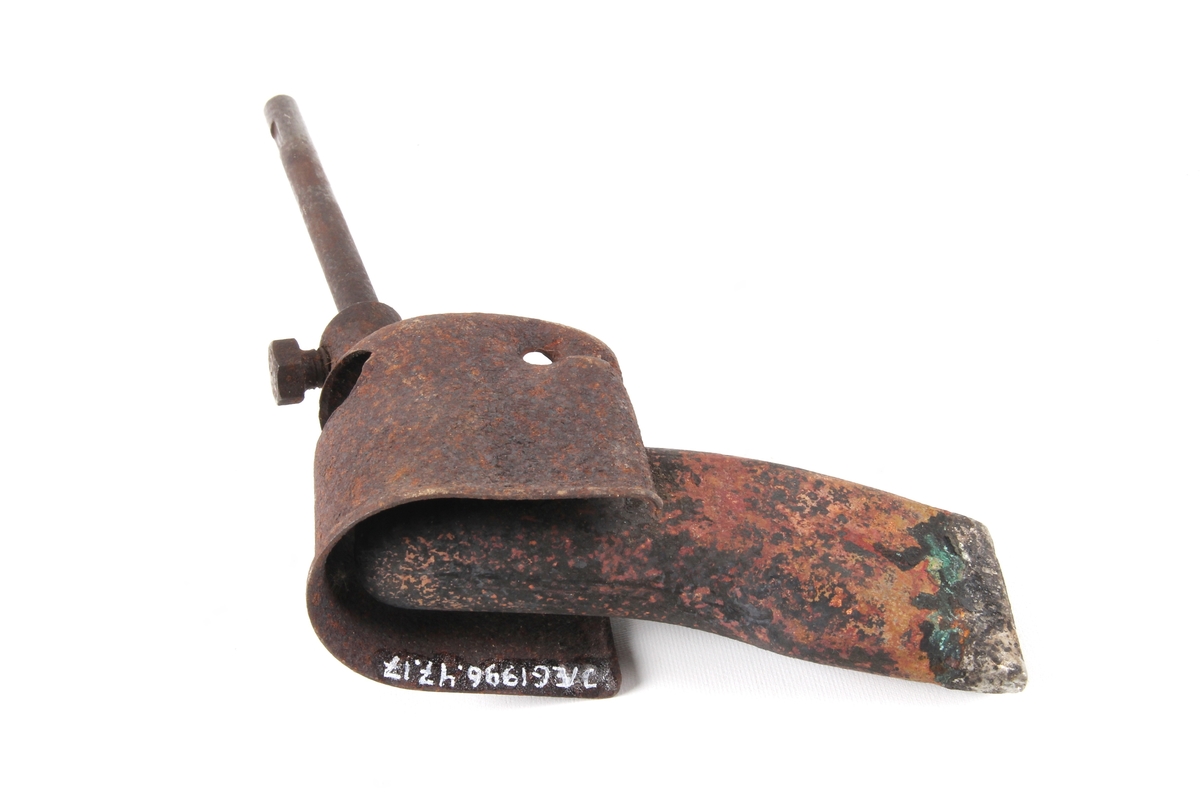 Loddebolt hode. Håndtak med varmekilde (trolig elektrisk) mangler.