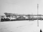 Malmtåg vid Kopparberg station under vinter.