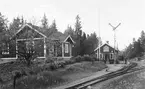 Ljusfors station med ankommande tåg. Stationen togs i bruk 1885.