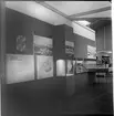 Montrar med modeller samt fotografier med informationstavlor vid utställningen i Göteborg 1962.