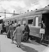 Vagn med texten Wagon lits et des grands express europeens.
Voiture lits
3920
Resande med Nordexpressen.
Bilden är tagen på Stockholm C, Stadshusets torn skymtar bakom vagnen.