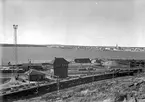 Luleå stad fotograferad från Svartön. Bilden användes vid Malmbanans utställning 1937.