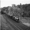 Historiska tåget passerar tunneln strax väster om utsikten ovanför Tullingesjöns innersta del. Resa från Stockholm till Göteborg för invigningen av Tåg 62. SJ B 3 