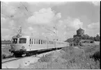 Statens Järnvägar, SJ Xoa5 216 på linjen mellan Olskroken och Göteborgs Central. I bakgrunden syns Skansen Lejonet.