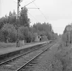 Hemsjöstrand hållplatsbyggnad och plattform.