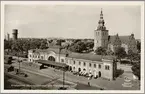 Vy över Kristianstad centralstation och Trefaldighetskyrkan.