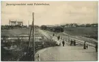 Ångtåg vid Falsterbo station och hotell Falsterbohus i bakgrunden.