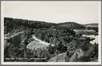 Tullinge järnvägsstation. Den sydligaste delen av Tullingesjön kan ses i den högra delen av fotografiet.