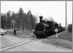 Statens Järnvägar, SJ Gp 3041 vid järnvägsövergången strax väster om Näsbykulla station.