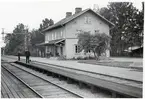 Åshammar station med stins Gustaf Ericsson.