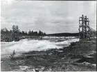 Byggnad av hängbron över Luleälven.