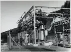 Kraftleverantörens transformatorstation. Ort okänd.
