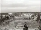 Vy över Skellefteälven vid bron på linjen mellan Klutmark och Slind, längs statsbanan Bastuträsk-Skellefteå-Skelleftehamn.