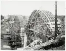 Tallbergsbroarna (Nyåkersbron) under konstruktion 1918 över Öreälven.