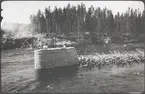 Bro över Vindelälven. Pelaren färdig juni  1921.