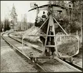 Underhåll av banan med hjälp av förvagnen till  ballaststoppmaskin på sträckan mellan Harsjön och Bälgviken 1967.