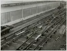 Utanför fabrik där det tillverkas järnvägsräls 1958.