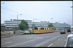 Stor gata med spårvagnstrafik och 
Budapest Southern Railway Station, Déli Pályaudvar i bakgrunden.