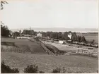 Storå station med Frövi - Ludvika Järnväg, FLJ malmvagnar och ett sadeltanklok.