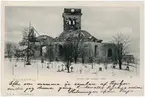 Den nedbrunna kyrkan Lovisa Ulrika från 1753 med kyrkogården i förgrunden. Brevkort.